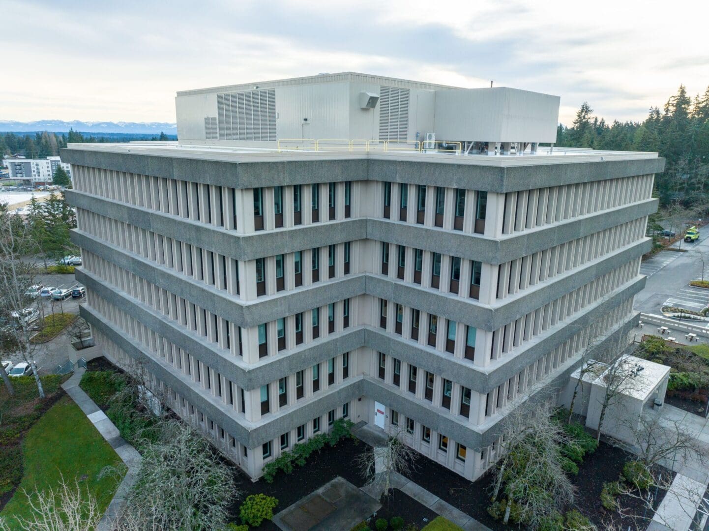An aerial view of a large office building.